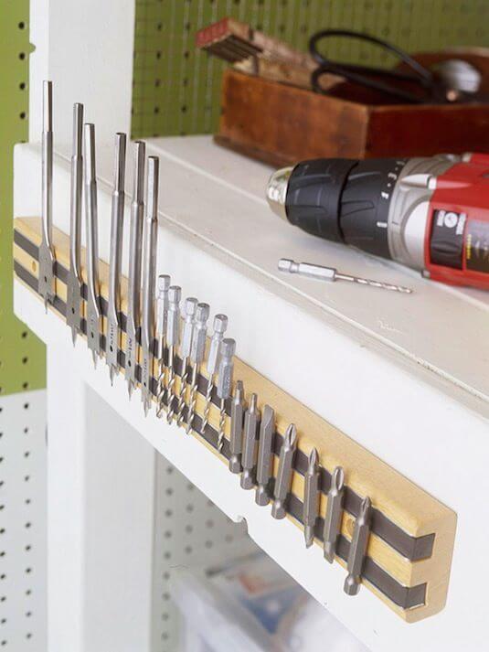 Brilliant-Garage-Organization-Ideas-Use-a-magnet-strip-to-hold-drill-bits-screws-wrenches-etc-1