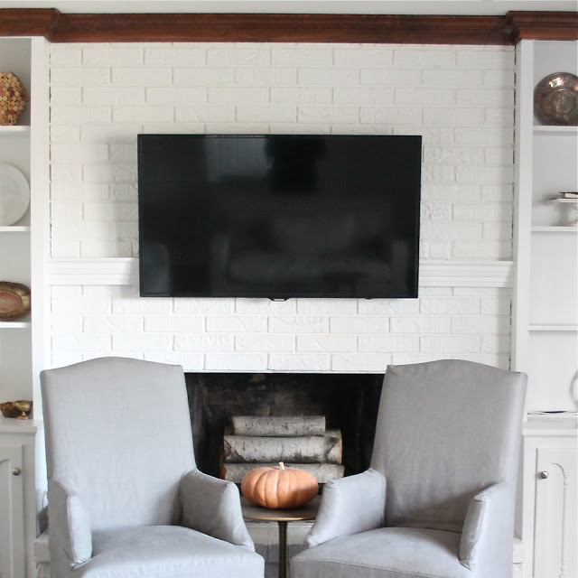 Fiscally Chic: Hiding TV Cords and Cables  Wall mounted tv, Hide tv cords,  Living room tv wall