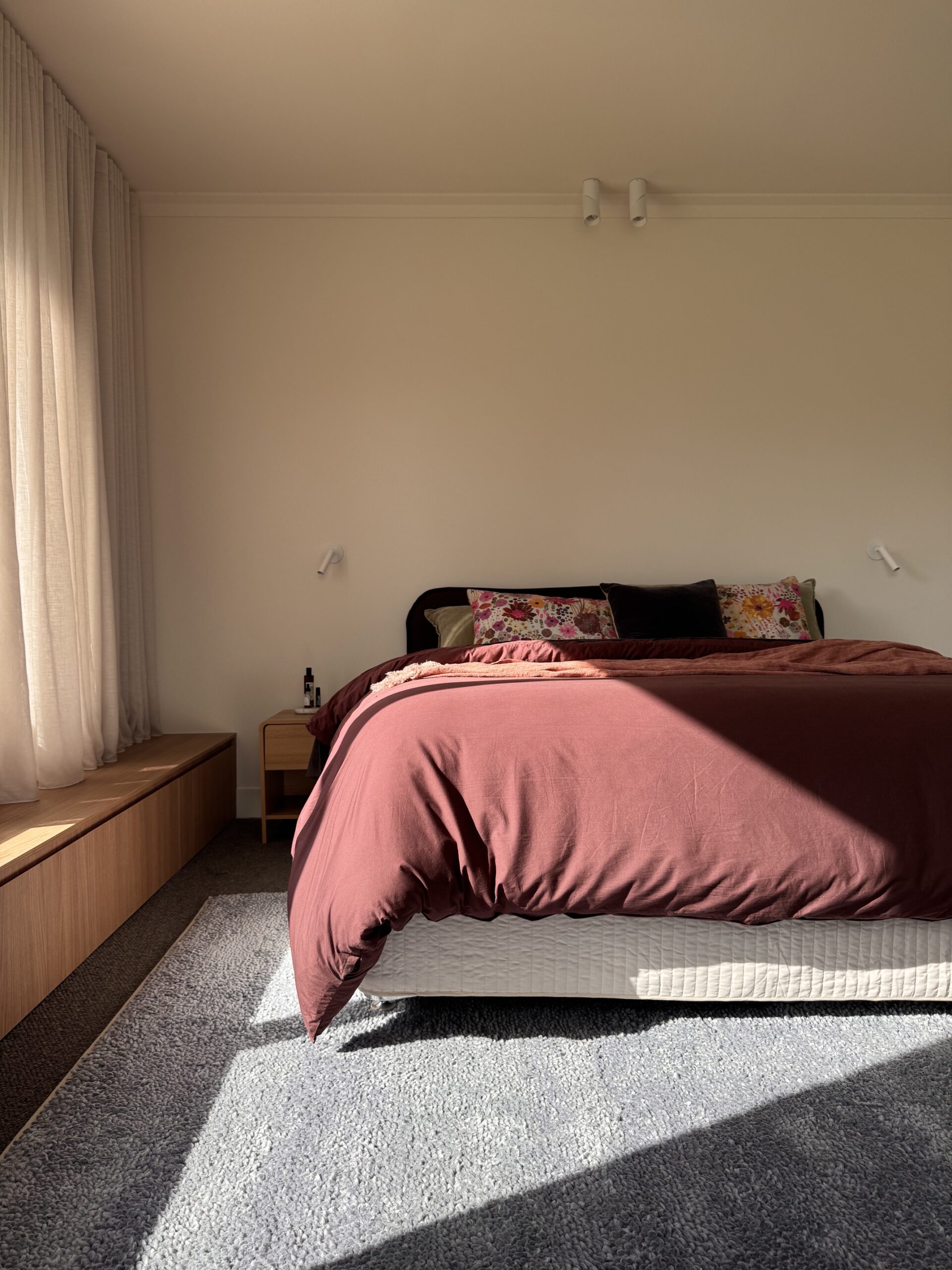 Timber slat divider with lit niche shelf